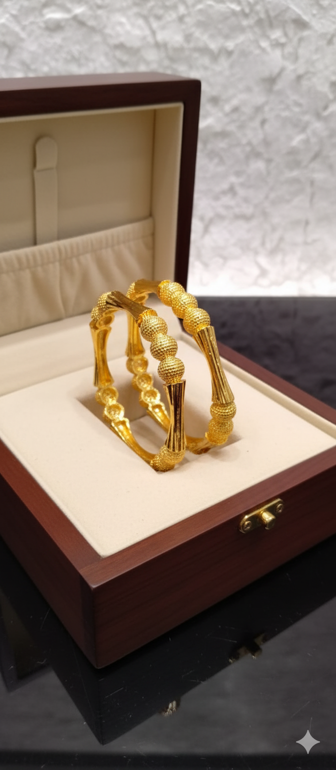 Intricate Stone & Gold Bangle Pair